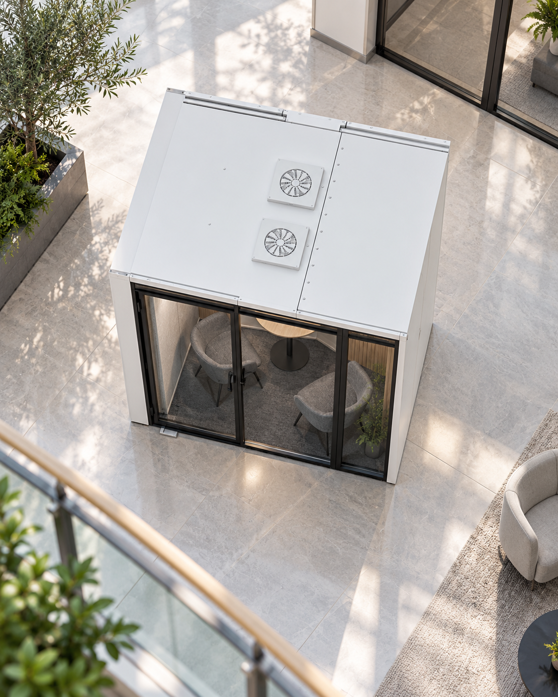 Multi-person acoustic meeting pod used as a private meeting room in a modern office